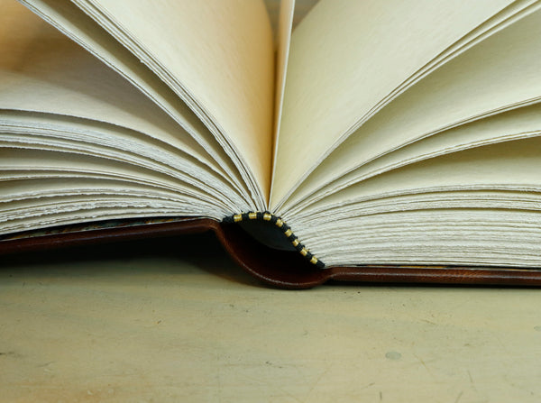 Antiqued leather journal, brown red leather, Gold tooled decoration. Once Upon a Time