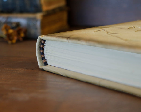 Natural leather journal with tooled floral decoration. One of a kind. Return to Nature