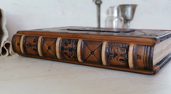 Large vintage leather journal, Tooled decoration with Dragon and Sword. Tea stained pages. "The Force within You"