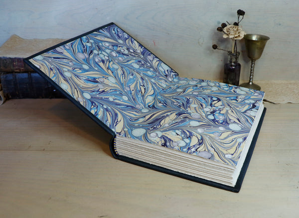 Dark Blue Leather Journal with gold floral decoration. The Midnight Garden