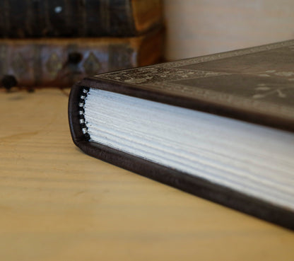 Grey Leather Journal with Silver tooled floral decoration. Moonlight Song