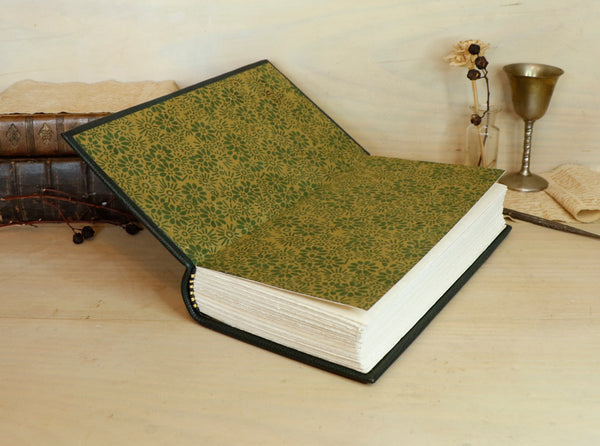 Dark Green Leather Journal with gold floral decoration. Romantic Journey