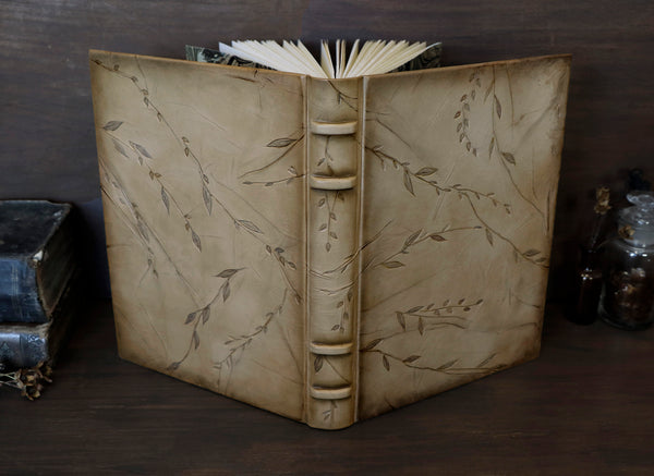 Natural leather journal with tooled floral decoration. One of a kind. Return to Nature