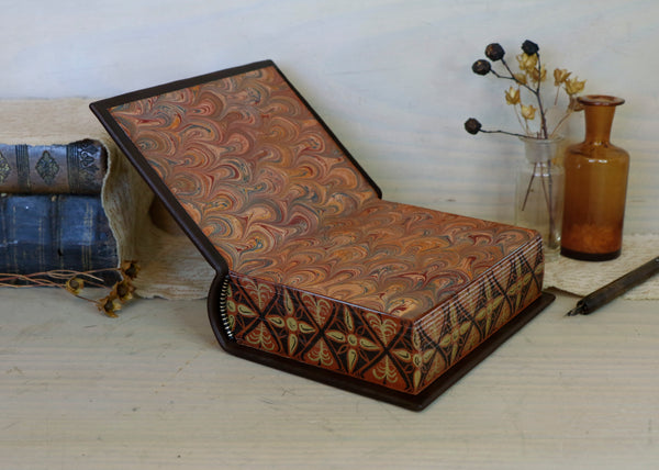 Leather journal with painted edges. Gold tooled and hand painted decoration. Secret Treasure
