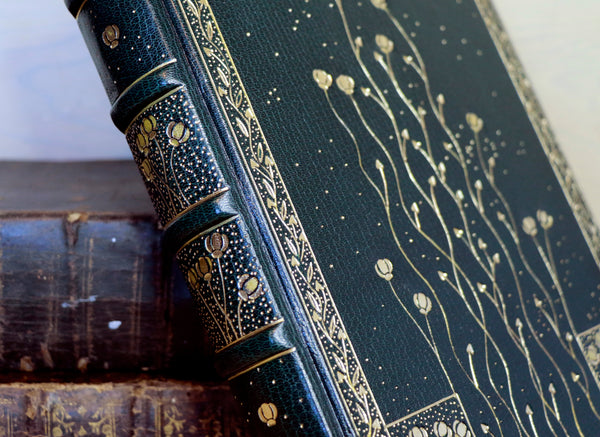Dark Green Leather Journal with gold floral decoration. Romantic Journey