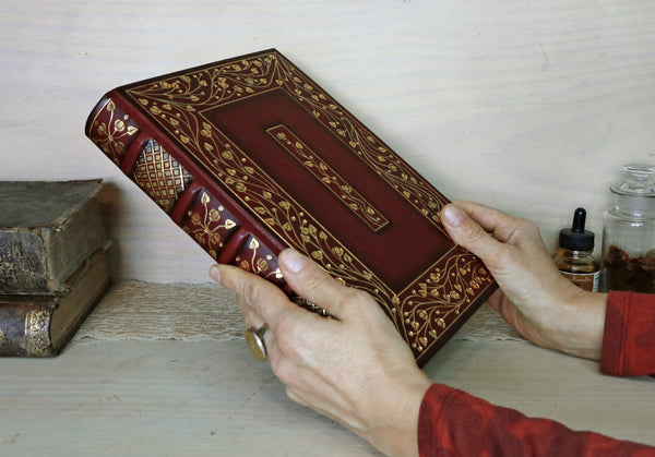 Burgundy leather journal with hand tooled gold decoration, Precious Moments