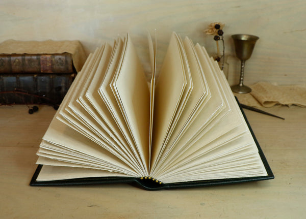 Dark Green Leather Journal with gold floral decoration. Romantic Journey