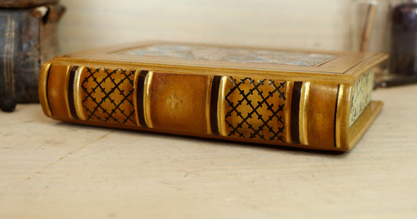 Leather journal with hand painted illuminated miniature on vellum and gold tooled decoration - Pelican Feeding Her Young