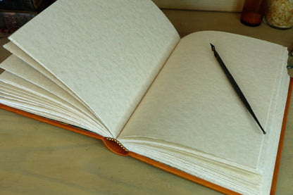 Antiqued orange leather journal with tooled decoration. Romantic Sunset II