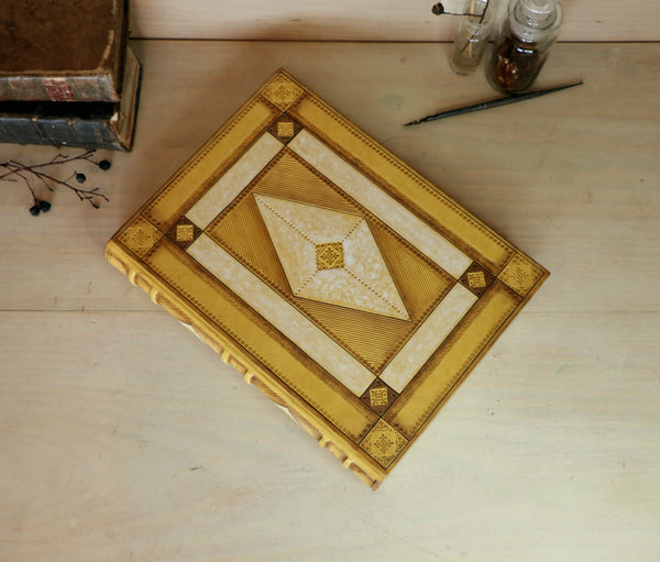 Antiqued yellow leather journal with tooled decoration. Romantic Sunset II