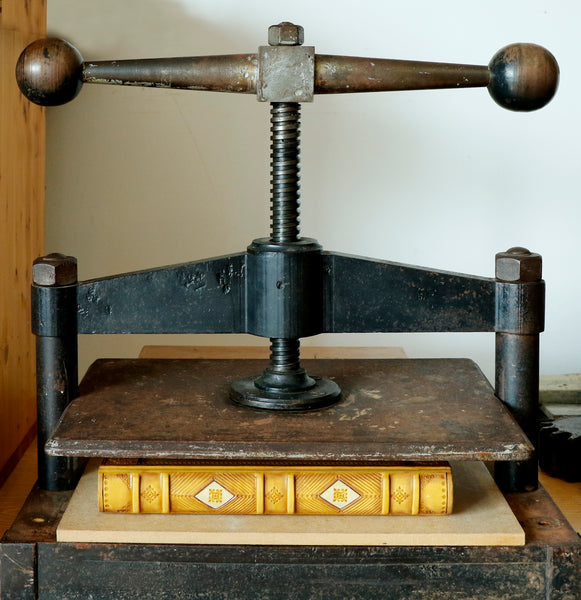 Antiqued yellow leather journal with tooled decoration. Romantic Sunset II