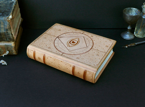 Natural leather journal with blind tooled decoration -  The Eye of the Universe