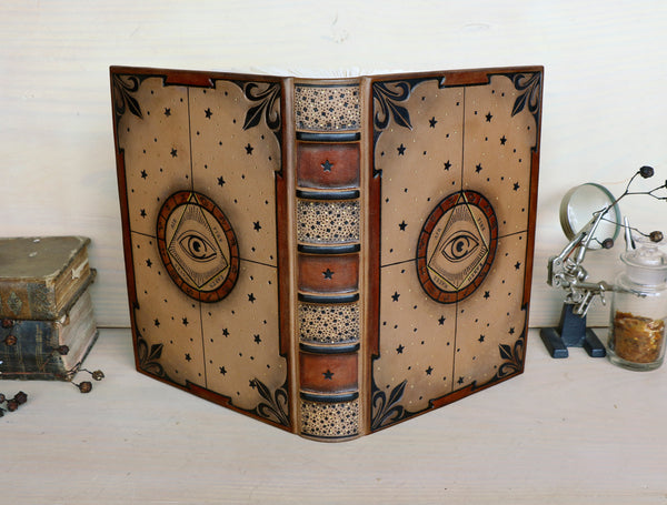 Brown leather journal with tooled decoration, The Circle of Time