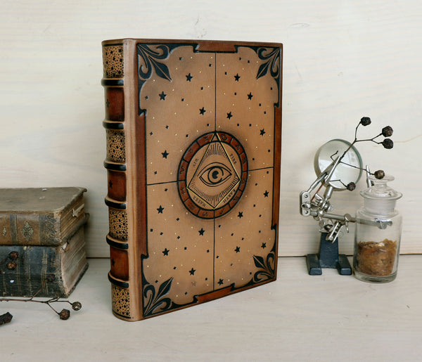 Brown leather journal with tooled decoration, The Circle of Time