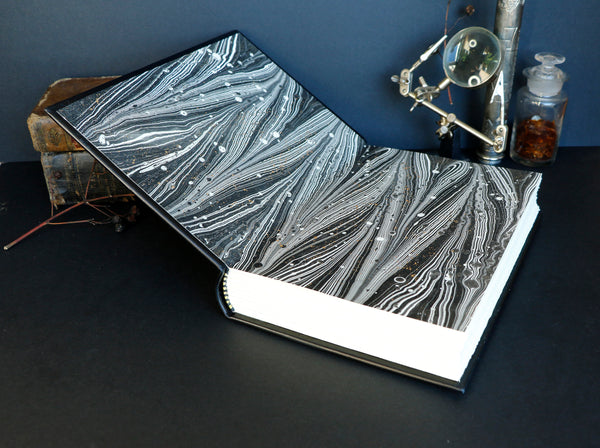 Black leather journal with Hand drawn white and gold foil decoration,