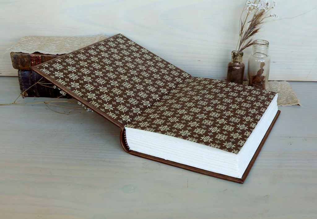 Brown leather journal with blind tooled decoration, Monochrome