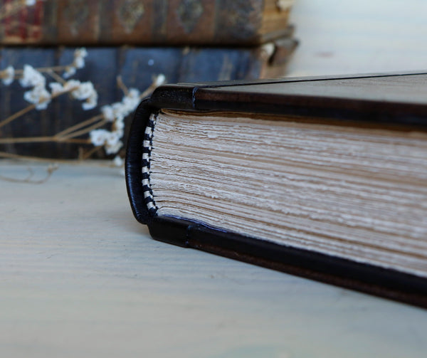 Large leather journal, Worn leather, Silver tooled decoration. The Old Book