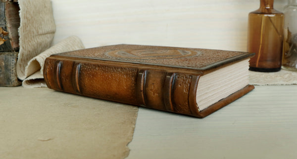 Brown leather journal with blind tooled decoration -  The Eye of the Universe