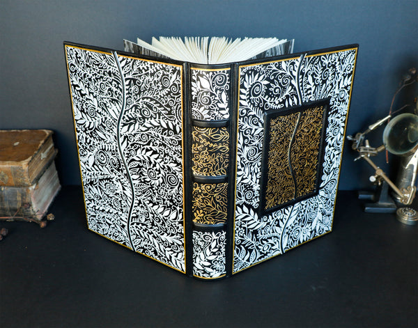 Black leather journal with Hand drawn white and gold foil decoration,