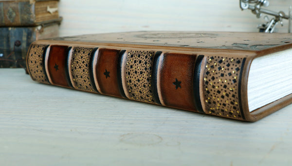 Brown leather journal with tooled decoration, The Circle of Time