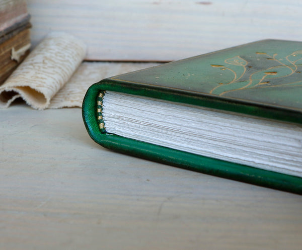 Green Leather Journal with gold floral decoration. Romantic Journey