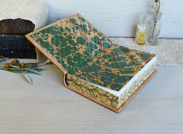 Leather journal with painted edges. Tooled and hand painted floral decoration. "Spring Swirls"